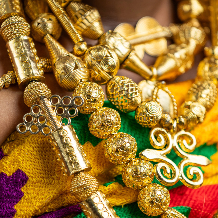 African textiles were more valuable than gold. African fabric with gold jewelry